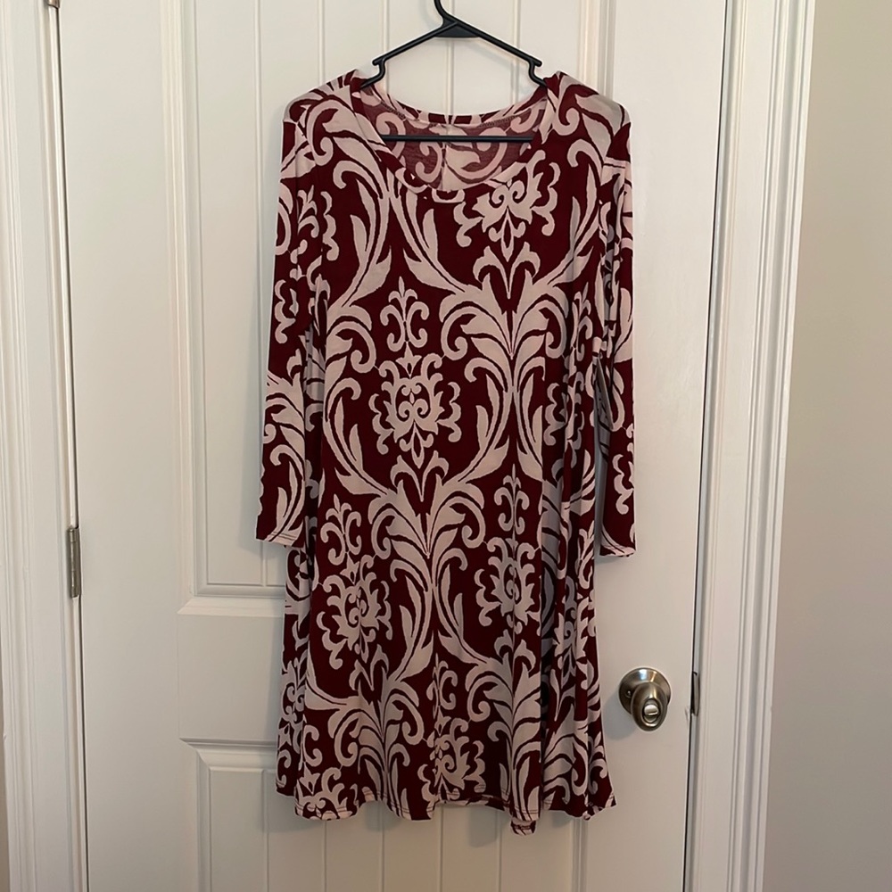 Red and cream/white dress
